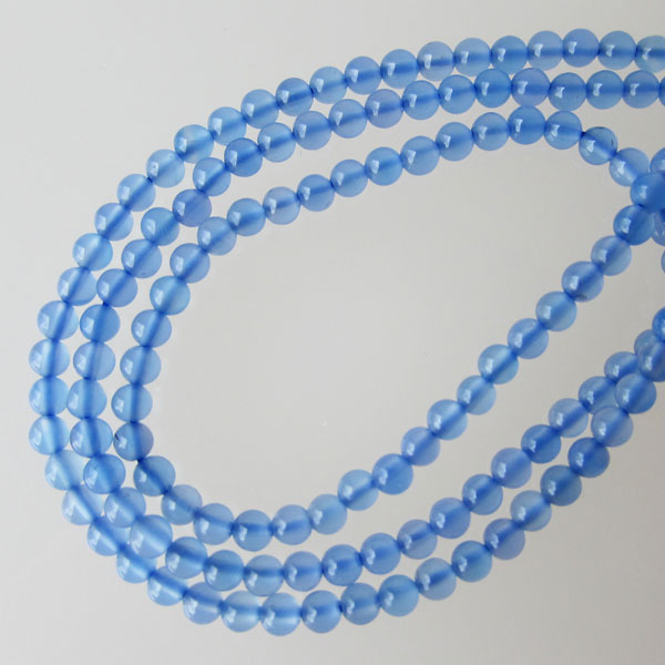 Agaat, aqua blauw met bruin, ovaal, ongeveer 13 x 10 mm, per streng