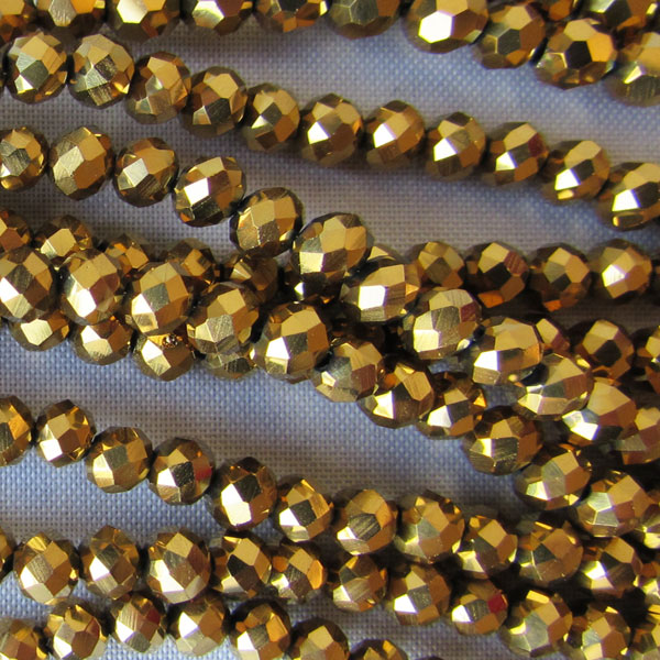 Swarovski-Style Kristalkraal, Gold Metallic, facetted, rondel, 3 x 4 mm, per streng