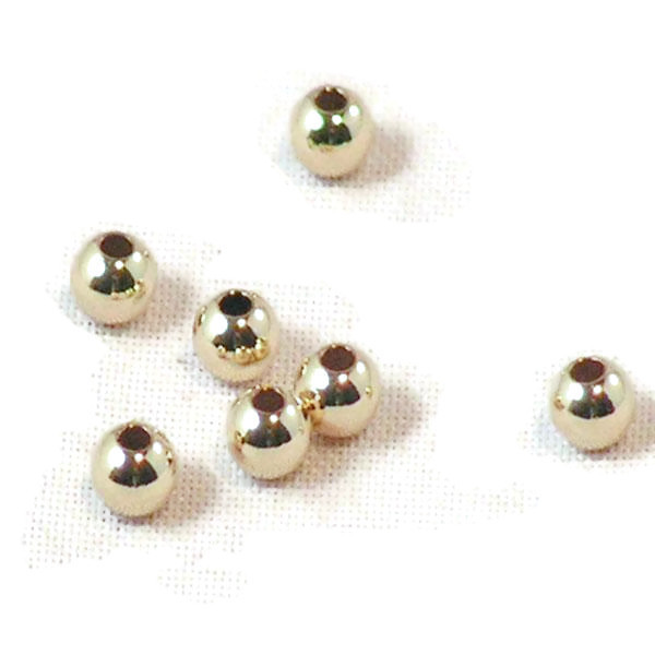 14 K Gold Filled kraal, 3 mm, rijggat 1.3 mm, verpakt per 50 stuks