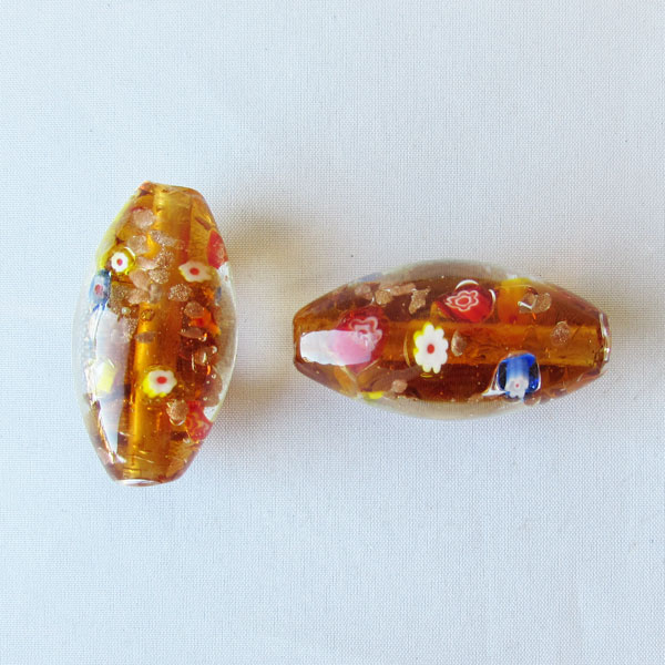 Grote glaskraal met groot gat, 45 x 22 mm, licht topaz, per stuk