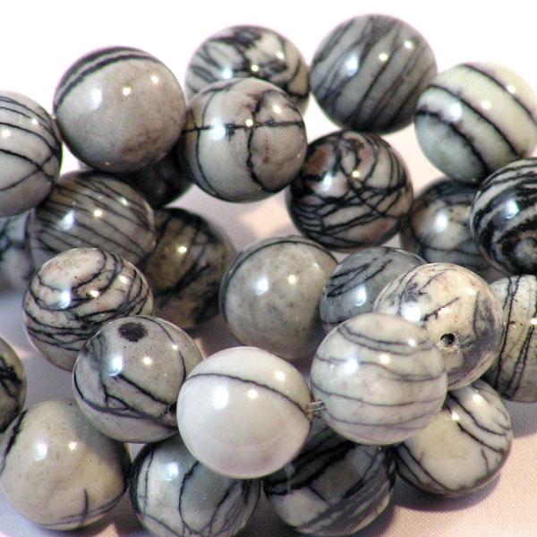 Jaspis Picasso, rond, 14 mm, verpakt per streng