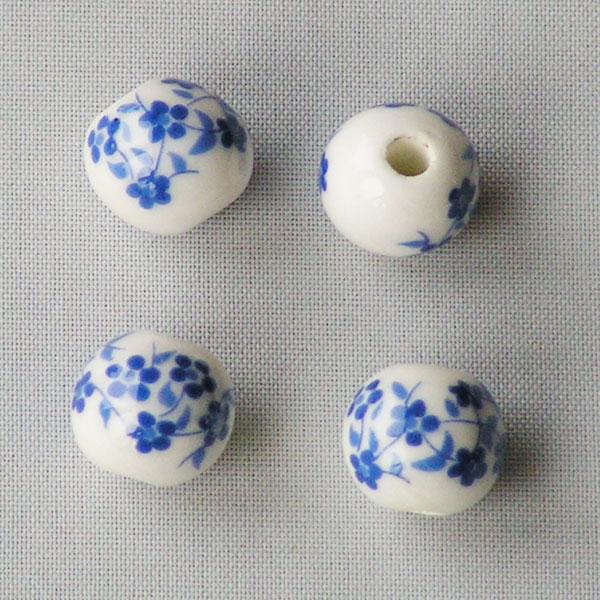 Porseleinen kraal, rond, 10 mm, koningsblauw-wit, per 50 stuks