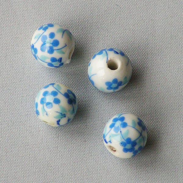 Porseleinen kraal, rond, 10 mm, blauw-wit, per 50 stuks
