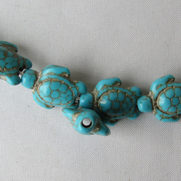 Turkooise kraal, schildpad, per streng